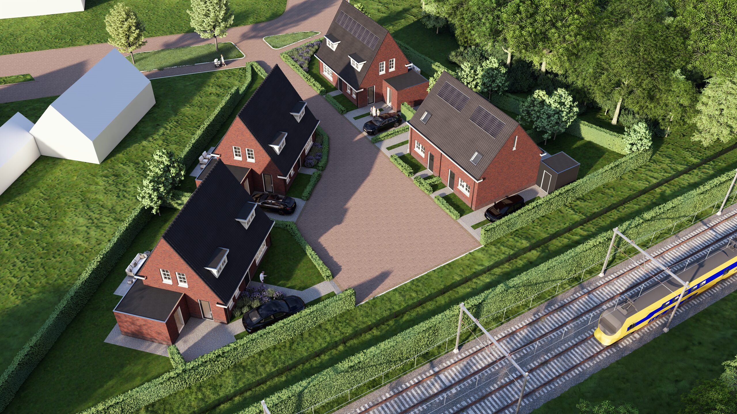 Luchtfoto van het nieuwbouwplan met het spoor
