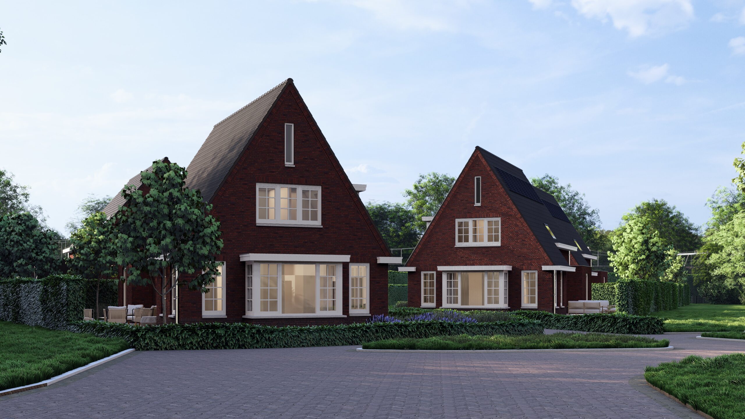 Twee vrijstaande woningen in de avondschemering